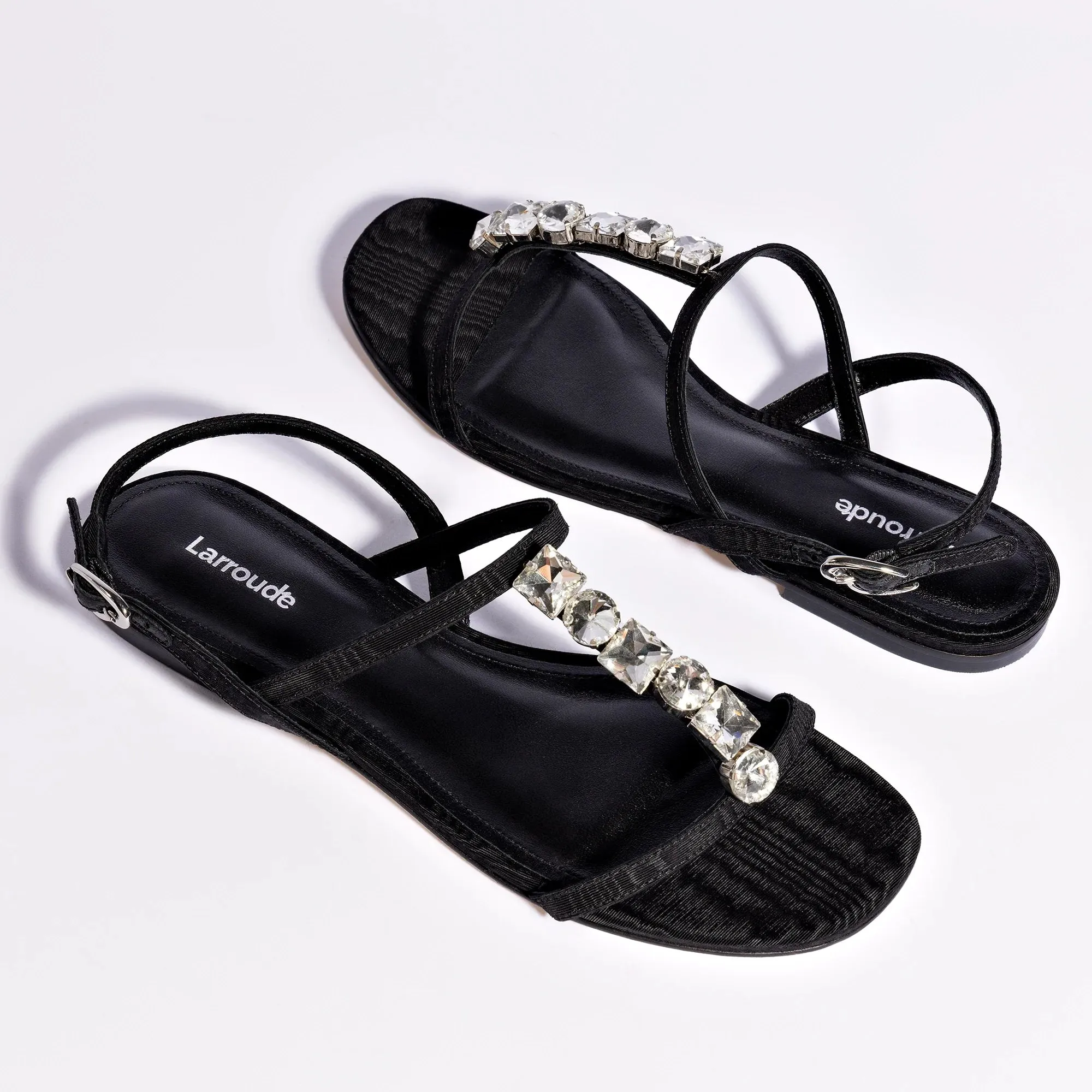 Larroude Calypso Flat Sandal In Black Fabric and Crystals